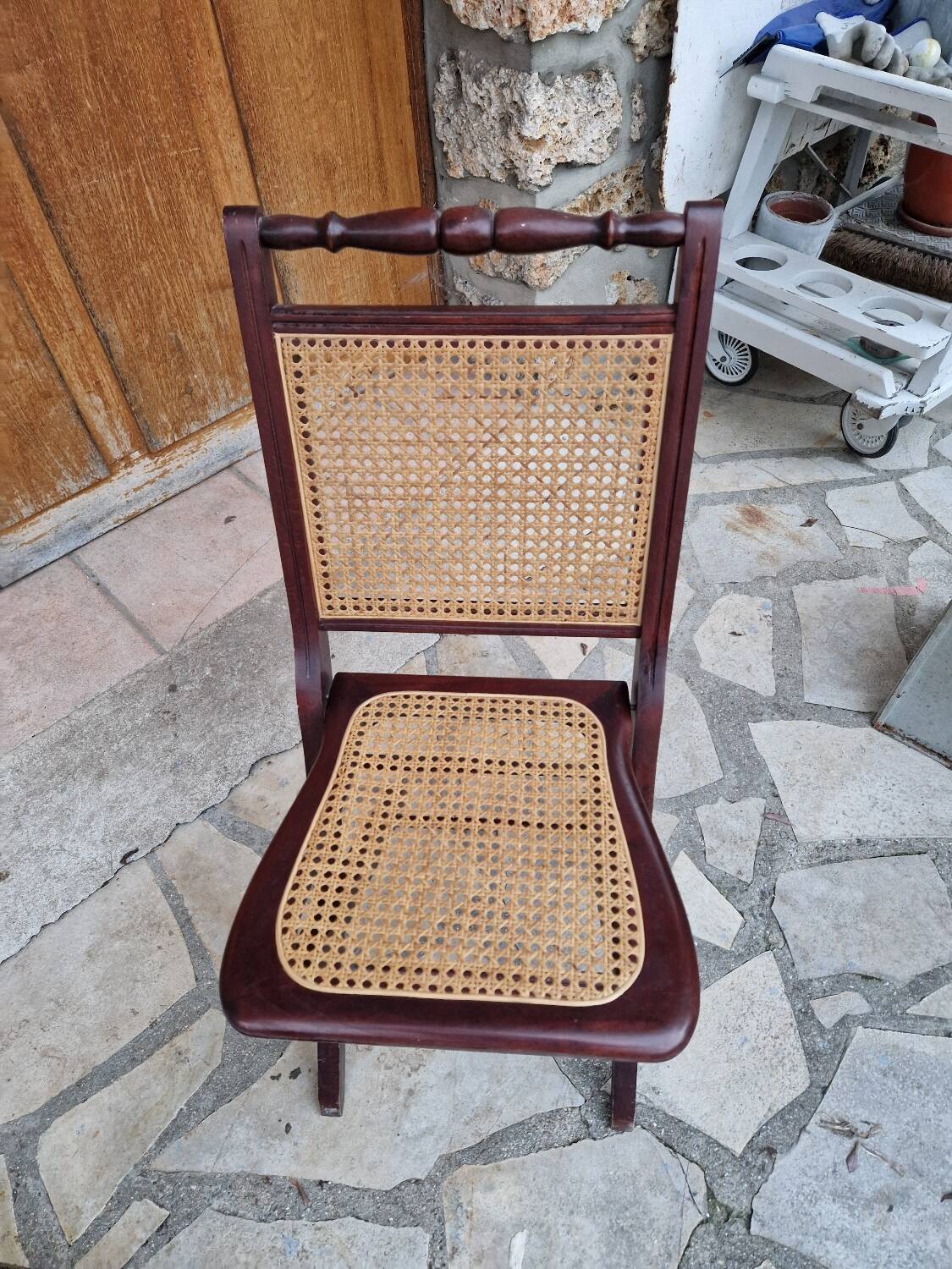 2 vintage caned folding chairs
