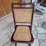 2 vintage caned folding chairs