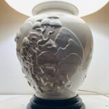 1980s ceramic table lamp with a wooden base and adjustable shade.