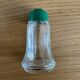 Vintage salt shaker with green Bakelite cap