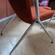 Pair of vintage folding chairs in terracotta fabric.