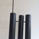 Designer umbrella stand in black lacquered metal