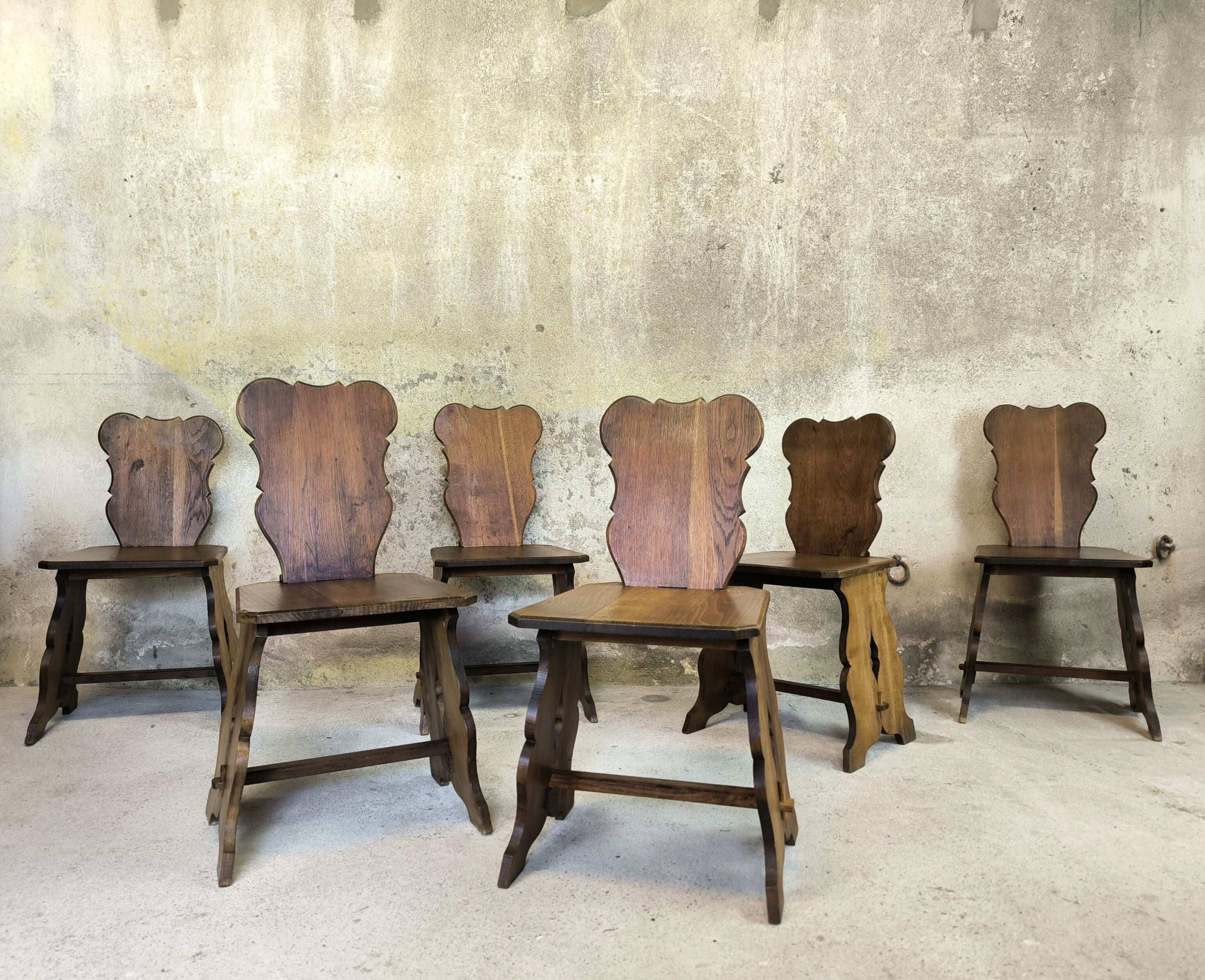 Set of six vintage brutalist wooden chairs.