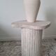 Alpha side table irregular natural travertine ribbed foot