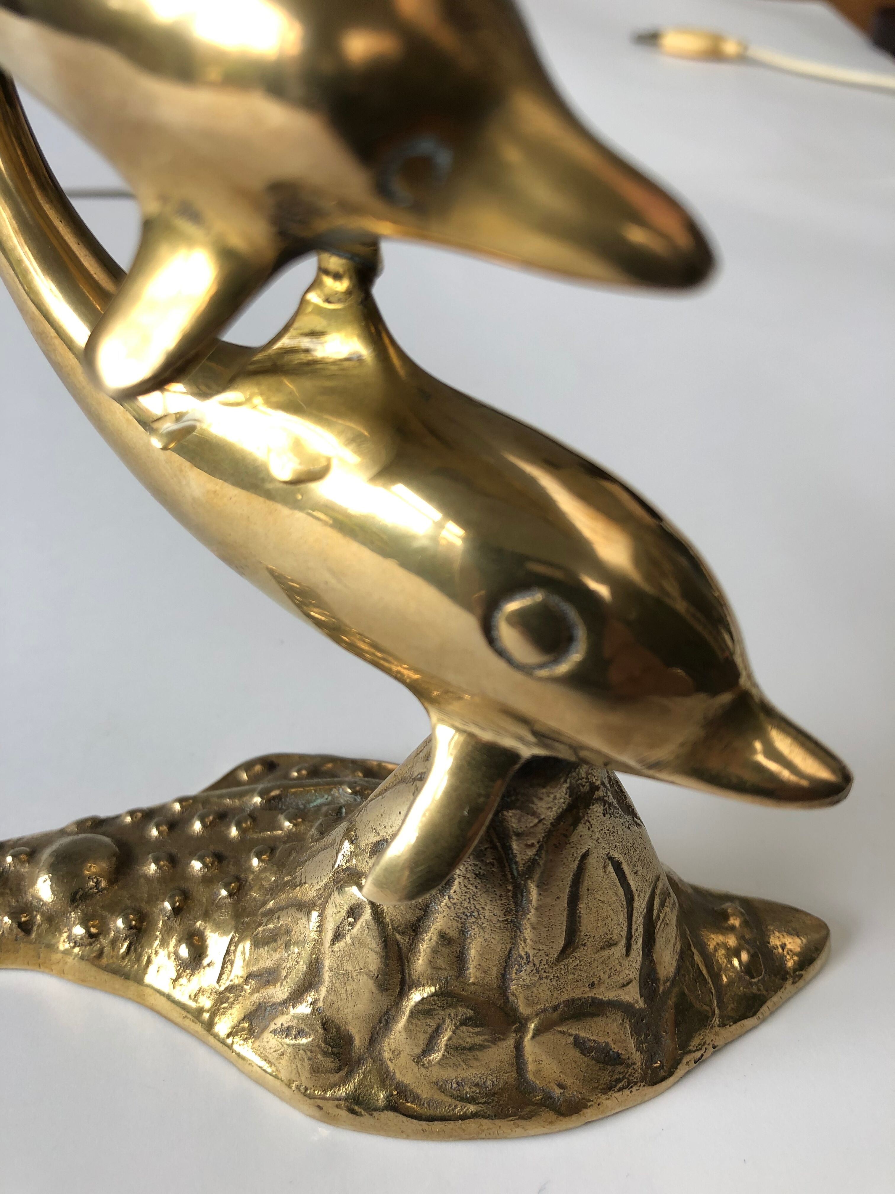 Dauphins en laiton