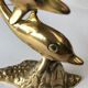 Dauphins en laiton