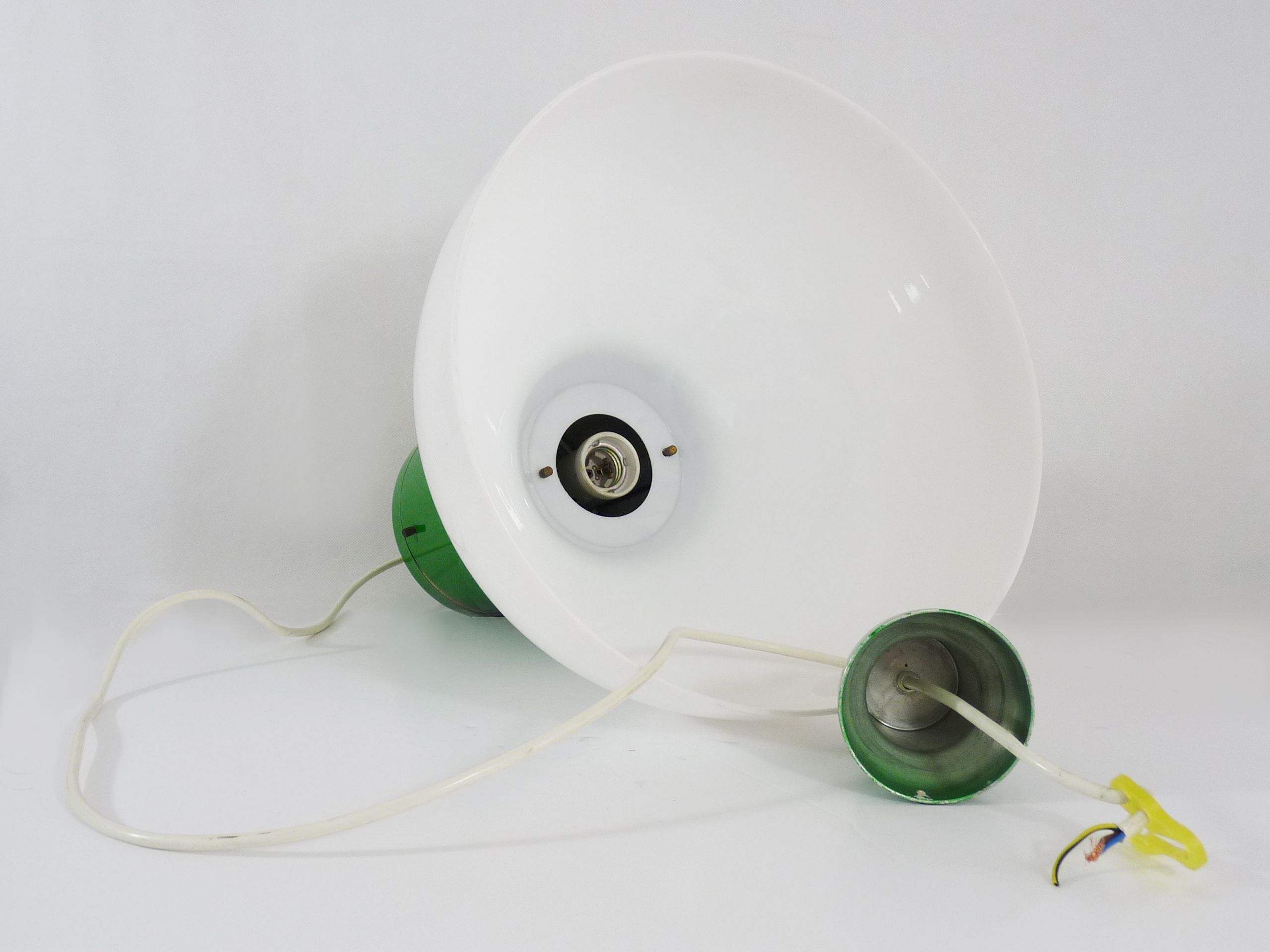 Vintage industrial suspension in green metal and white plastic lampshade. Year 70