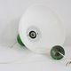 Vintage industrial suspension in green metal and white plastic lampshade. Year 70