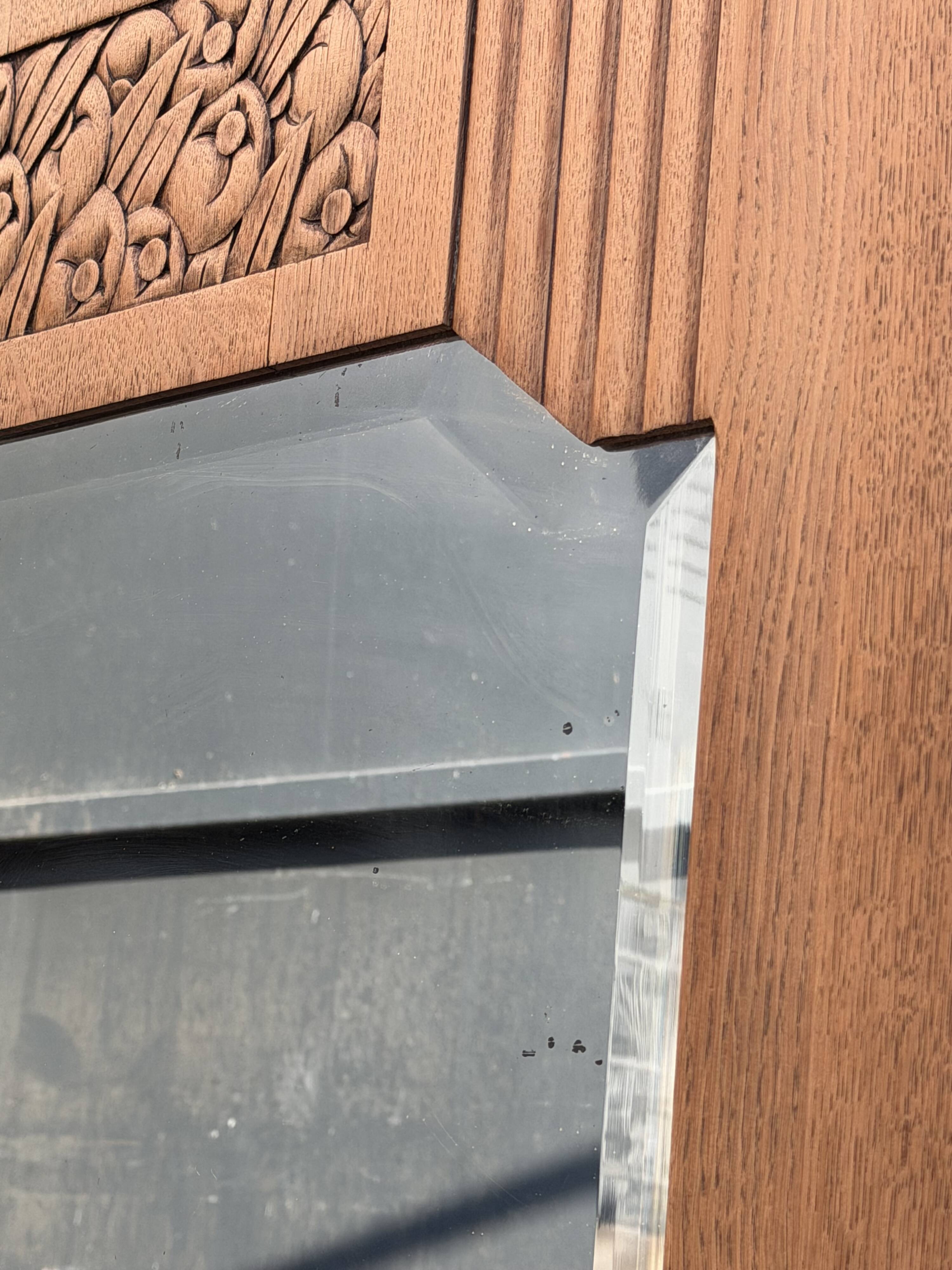Art deco wardrobe in raw oak with bevelled mirror.