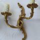 Old pairs of bronze wall sconces