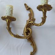 Old pairs of bronze wall sconces