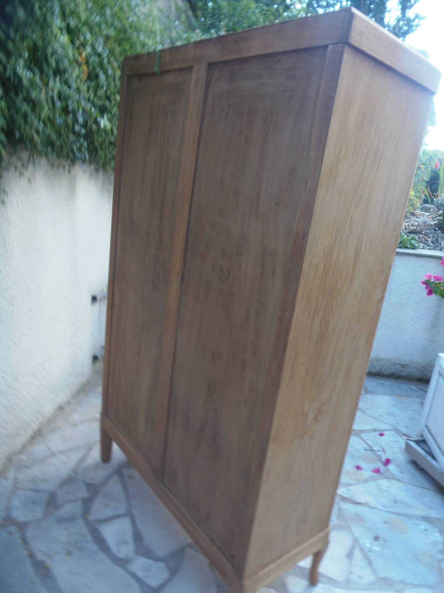 Charming vintage display cabinet from the 1950s in natural wood.