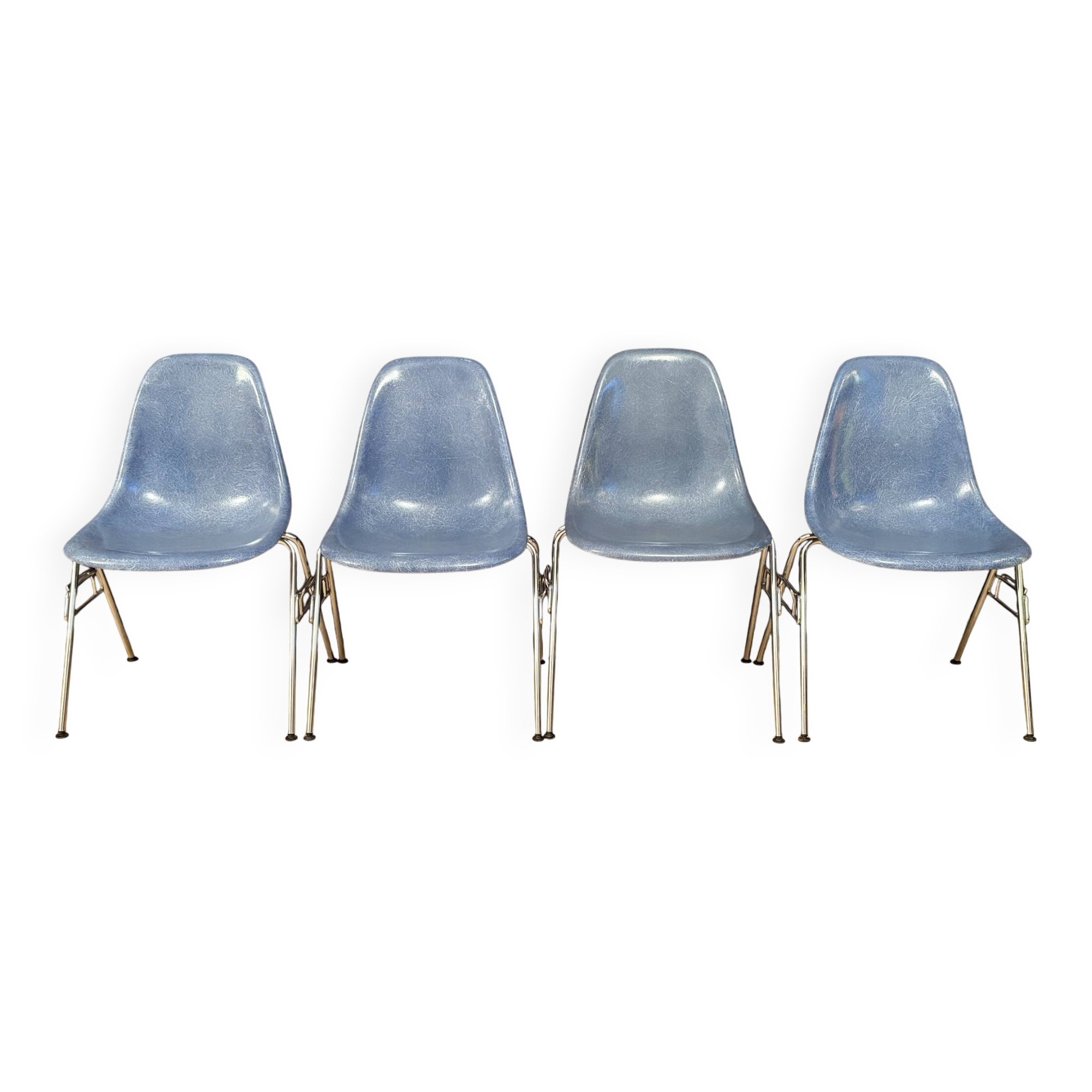 Set of four DSS chairs, fiberglass, designed by Charles and Ray Eames, Herm