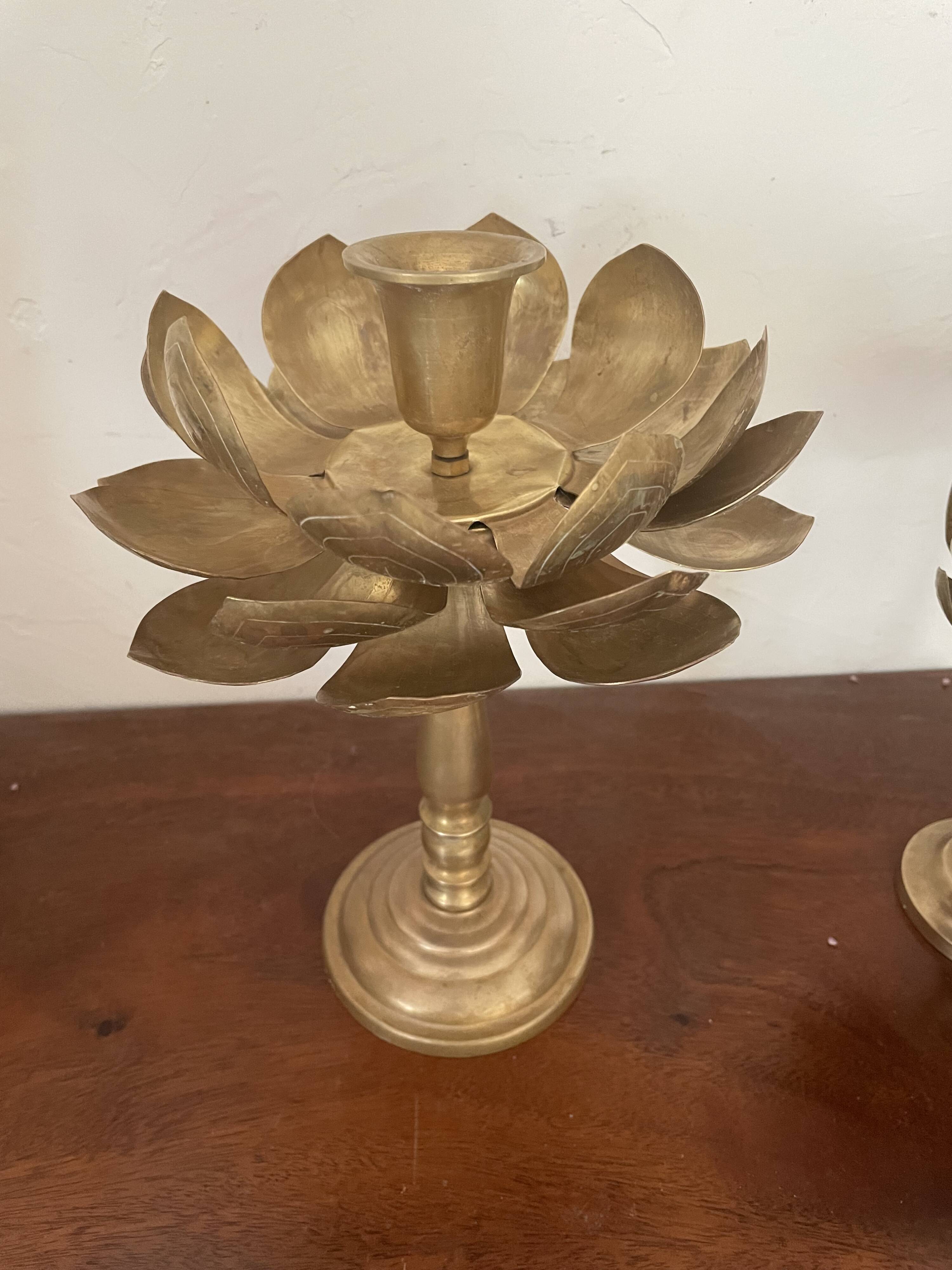 Set of two old brass lotus flower candlesticks