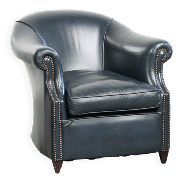 Dark blue club armchair made of cowhide leather with a timeless design