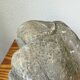 Stone sculpture of a man