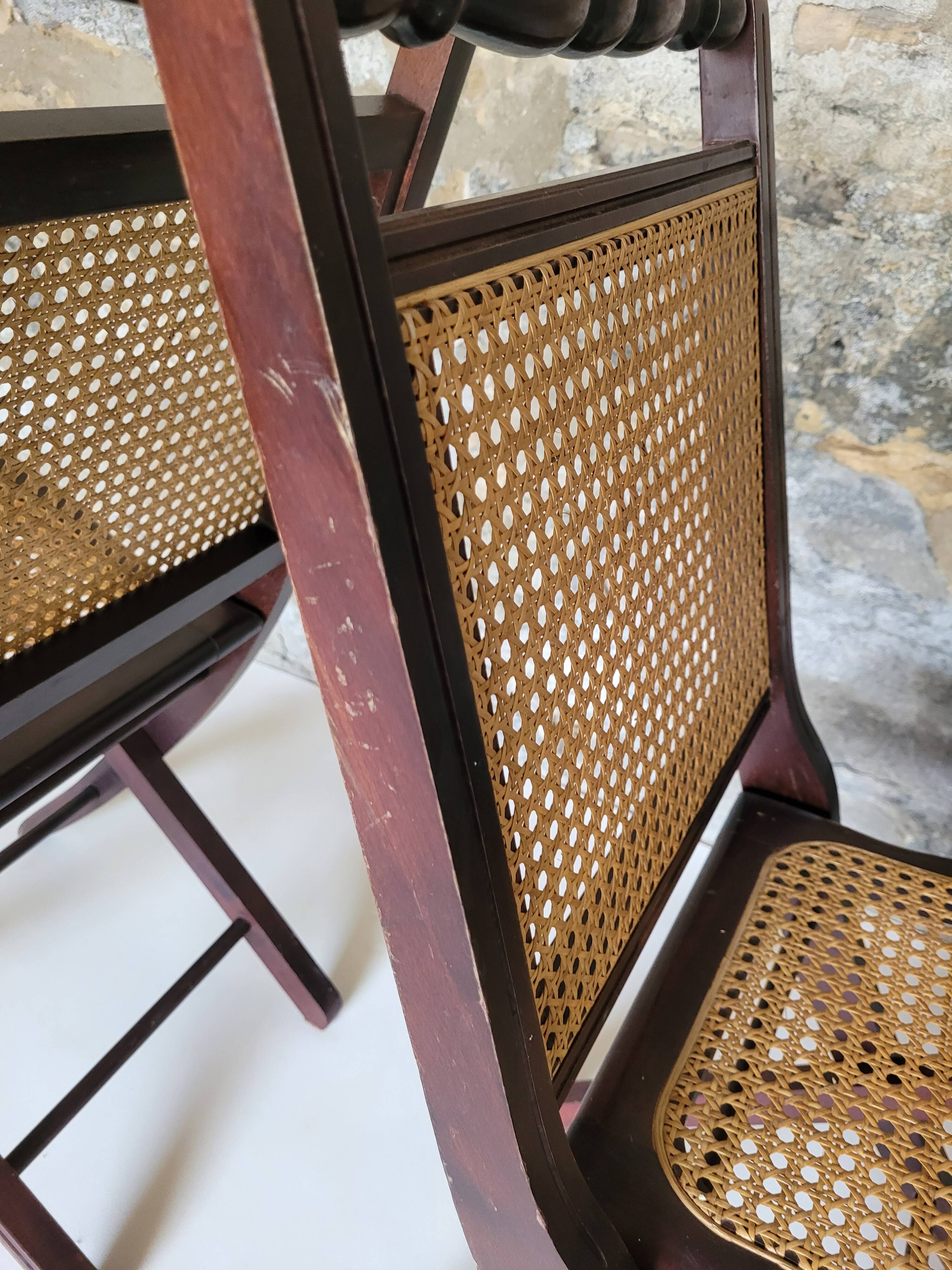 Pair of folding cane chairs