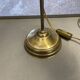 brass lamp that raises and lowers