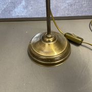 brass lamp that raises and lowers