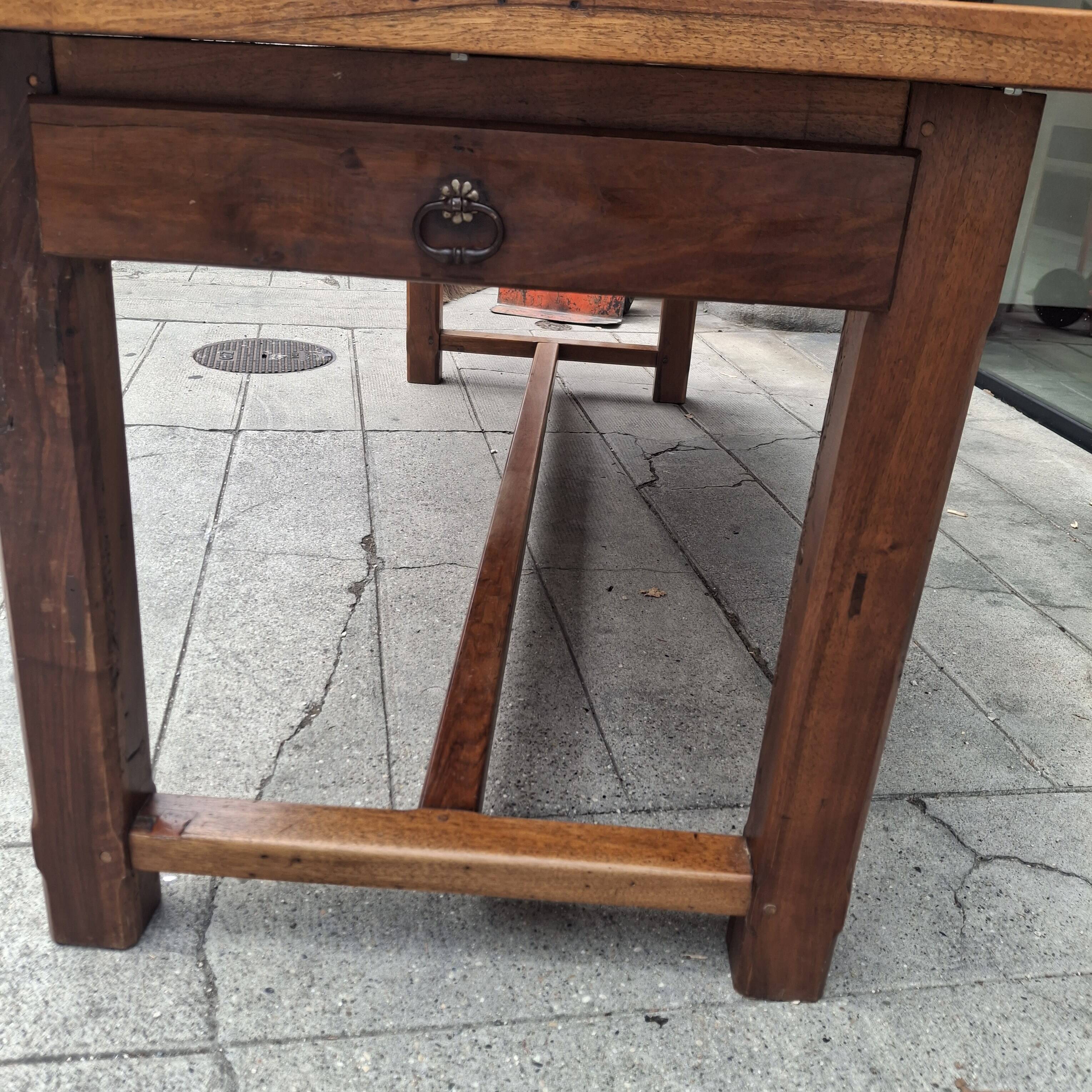 Large farmhouse table in walnut.
