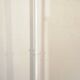 Adjustable metal floor lamp with its vintage smoked ball model from Roger Pradier 1970