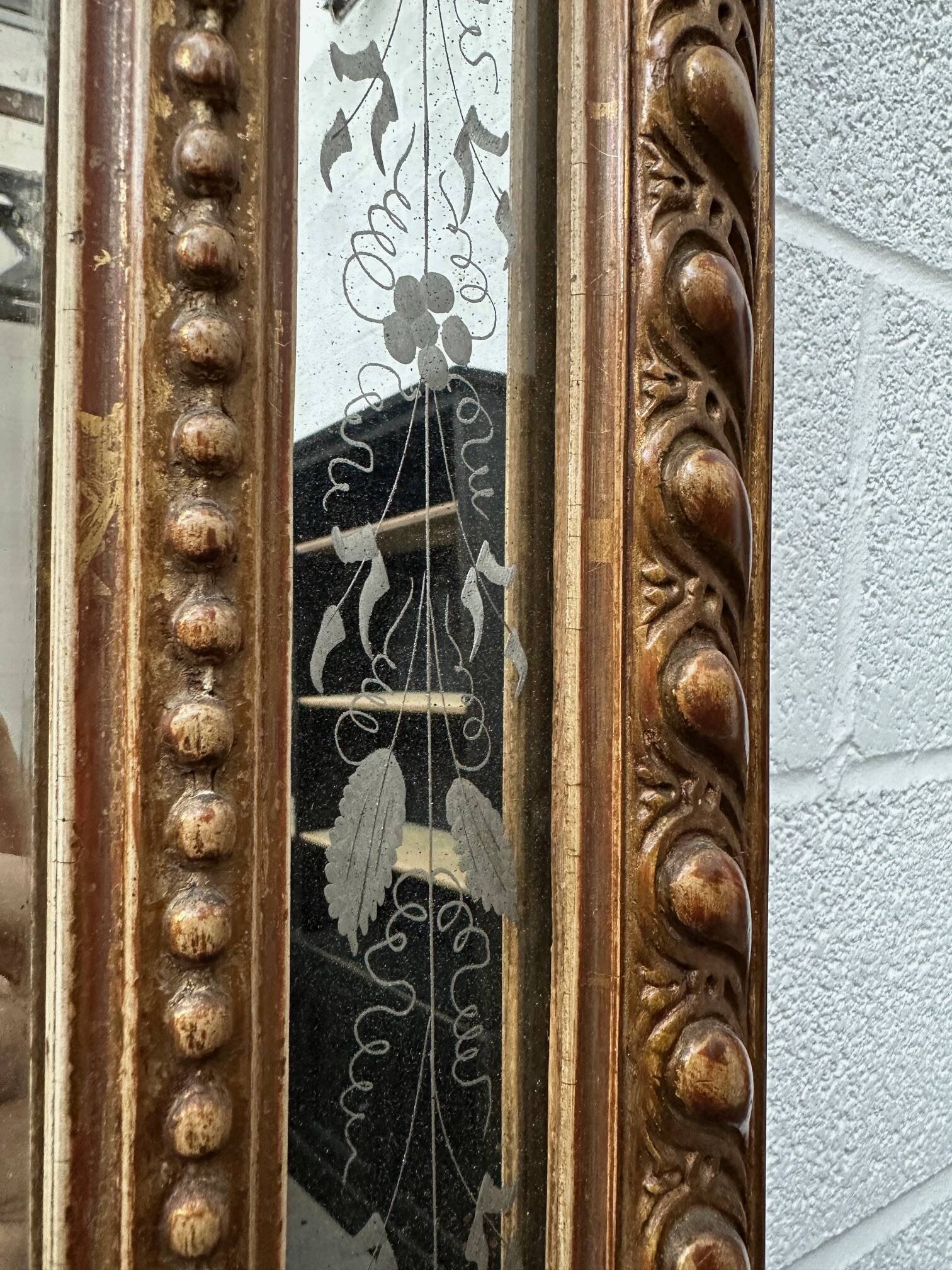 19th century mirror with cherubs