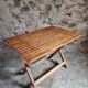 Vintage folding garden table in pine, mid-20th century.