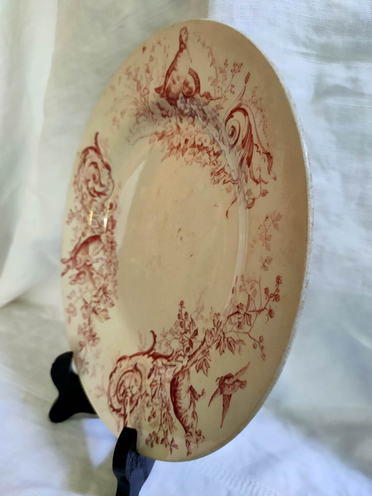 Assiette plate terre de fer faïence de Lunéville K/G