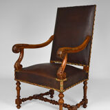 Louis XIII office armchair in leather and walnut carved around 1860