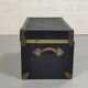 Old black trunk and brass