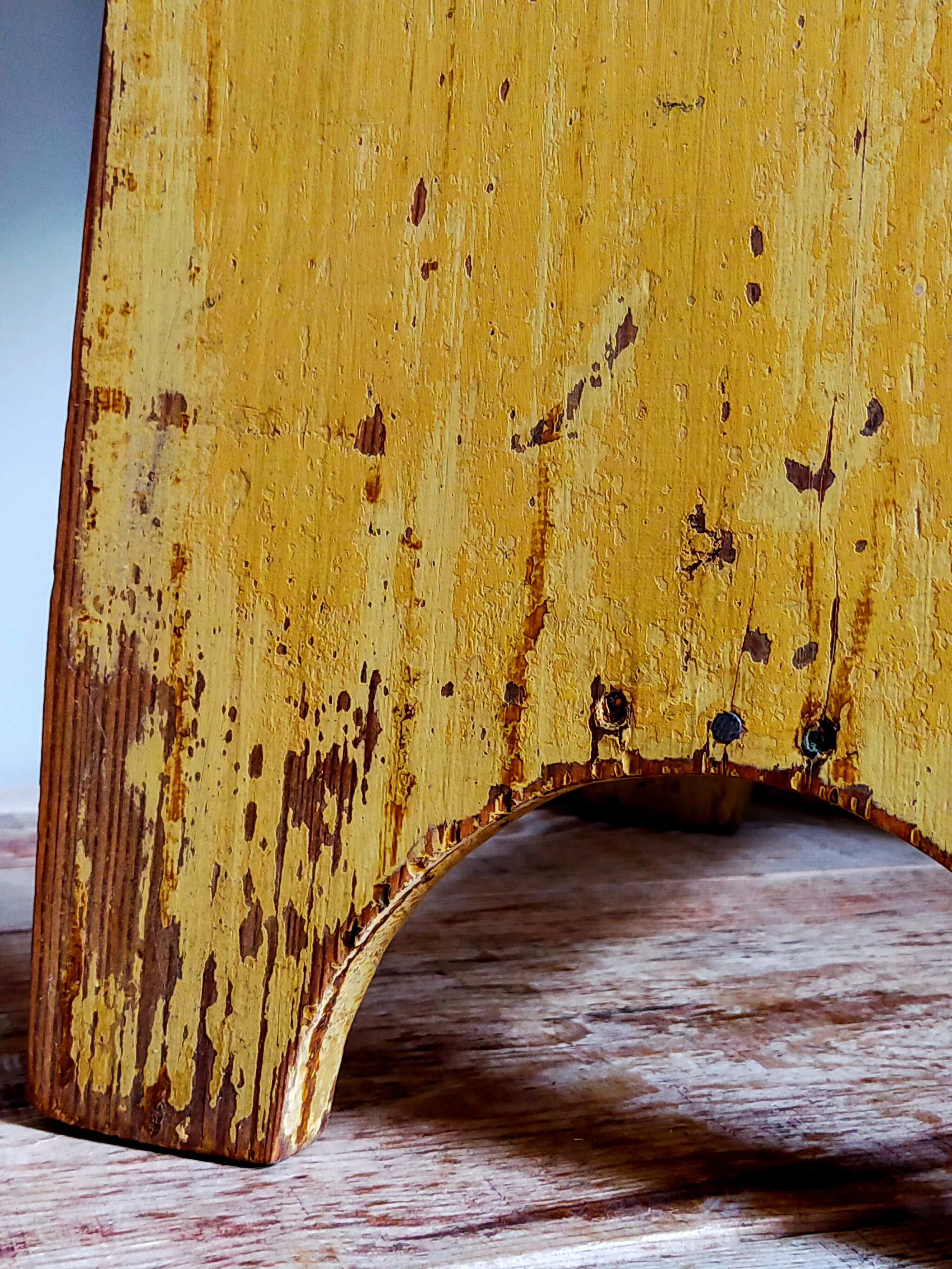 Art-populaire workshop stool in patinated wood