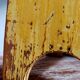 Art-populaire workshop stool in patinated wood
