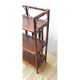 Dark rattan shelf