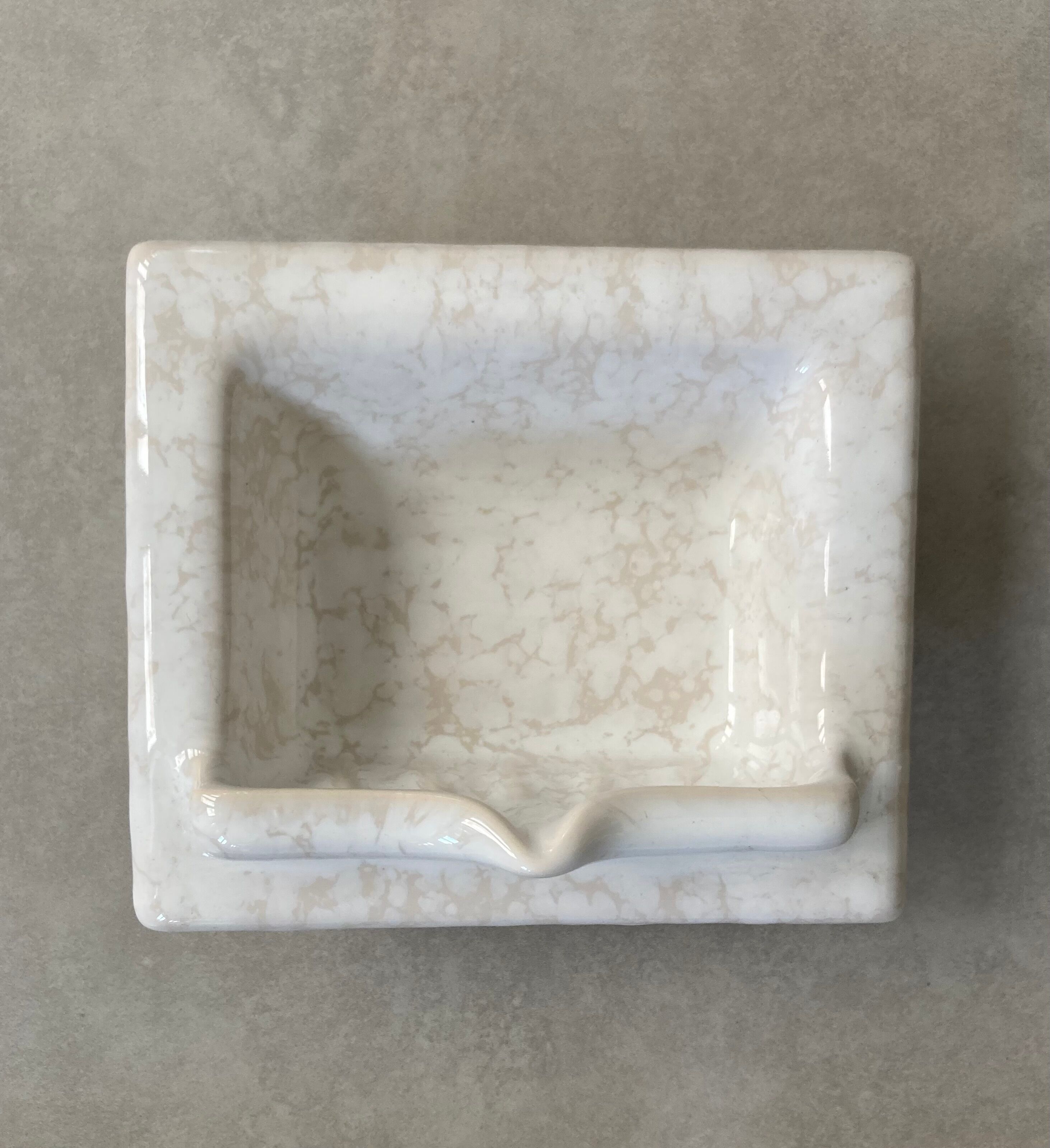 Wall mounted ceramic soap dish