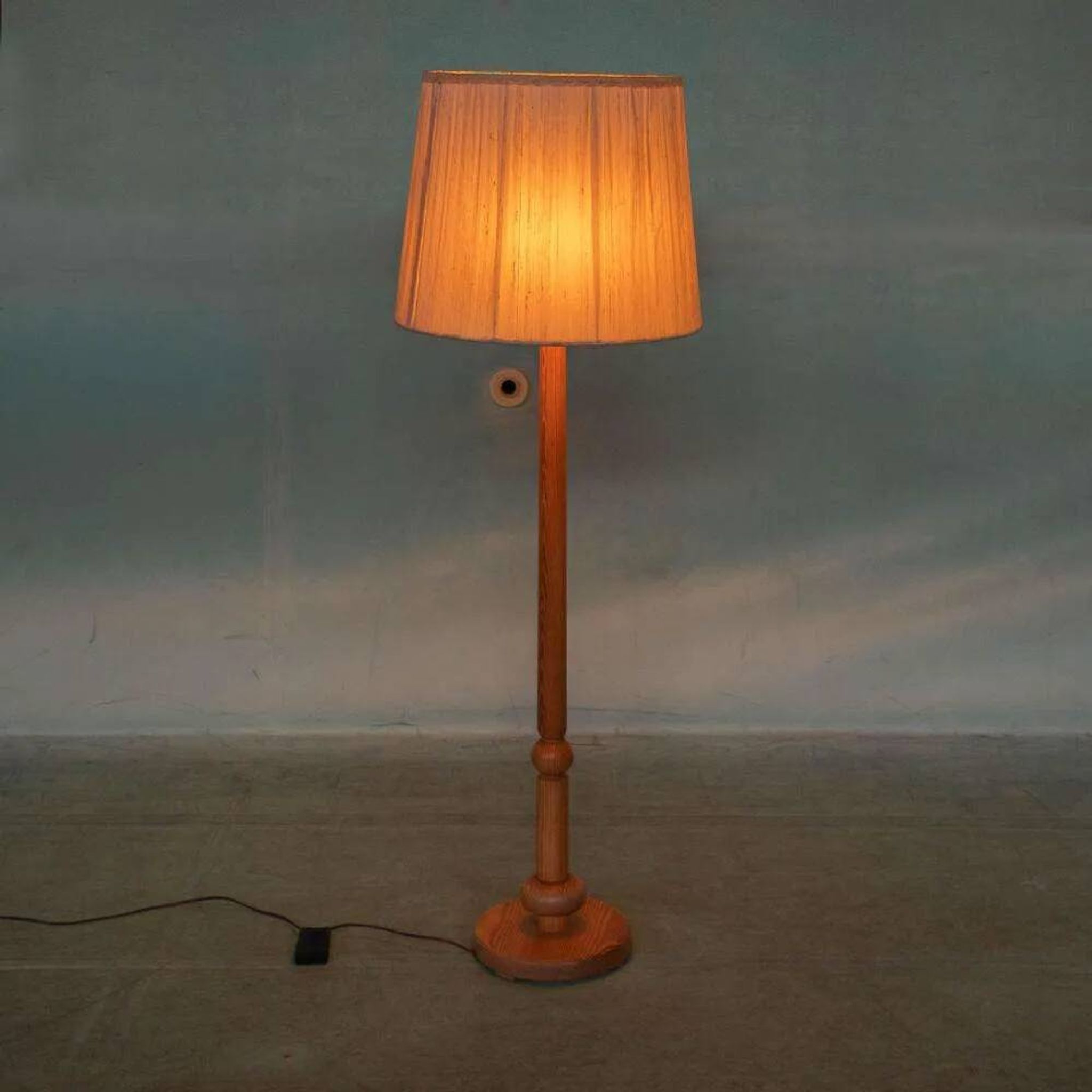 Vintage Swedish wooden floor lamp with pleated shade from the 1960s.
