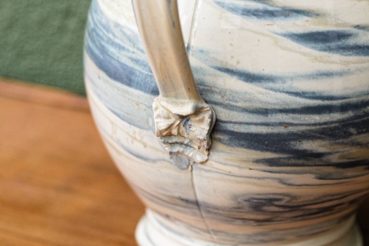 Water jug, signed, blue and white scrolls
