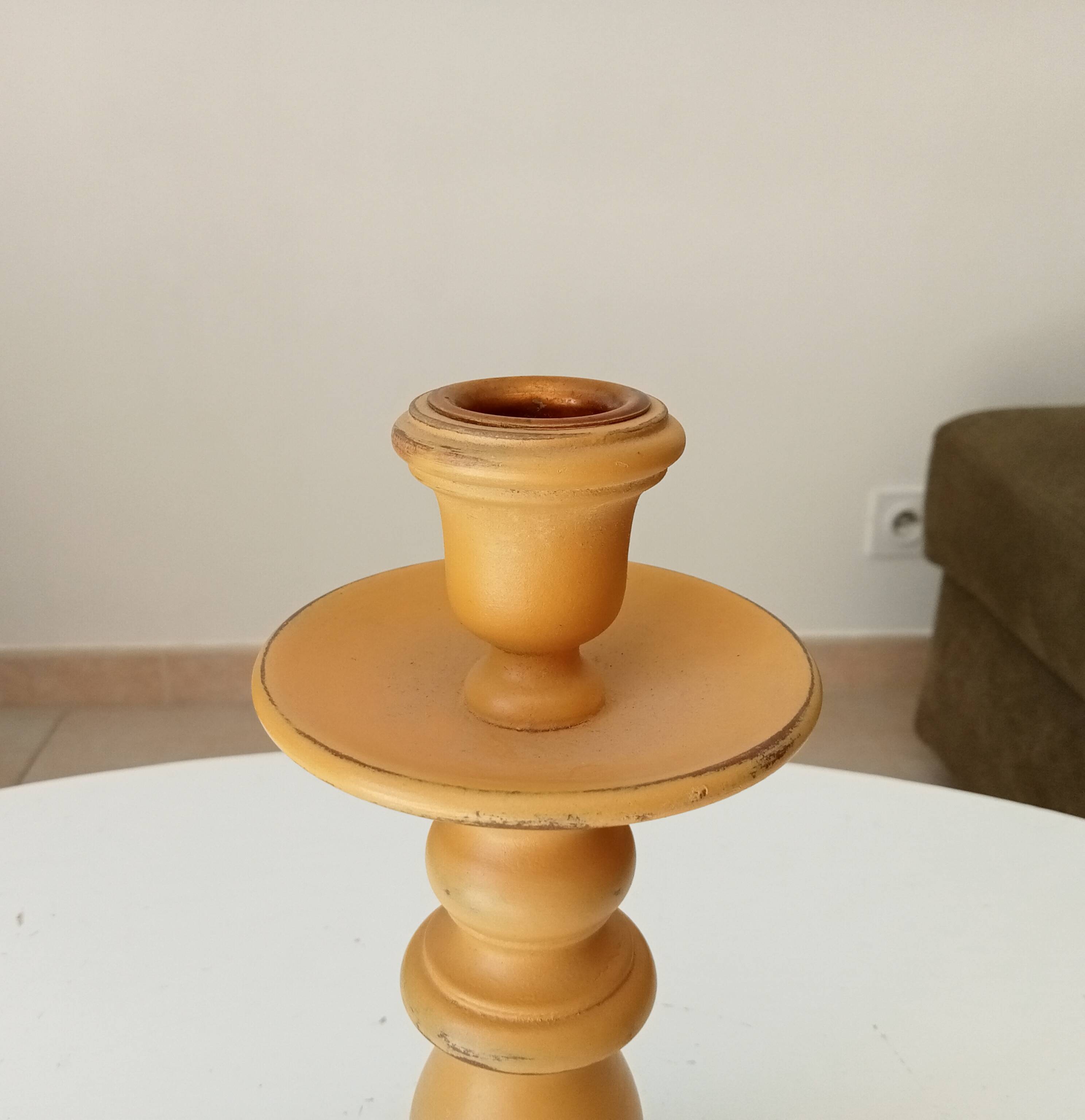 Vintage candle holder in weathered yellow wood