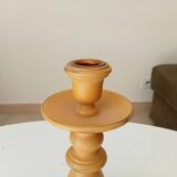 Vintage candle holder in weathered yellow wood