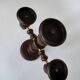 Vintage brutalist wooden candelabrum with gold hardware.