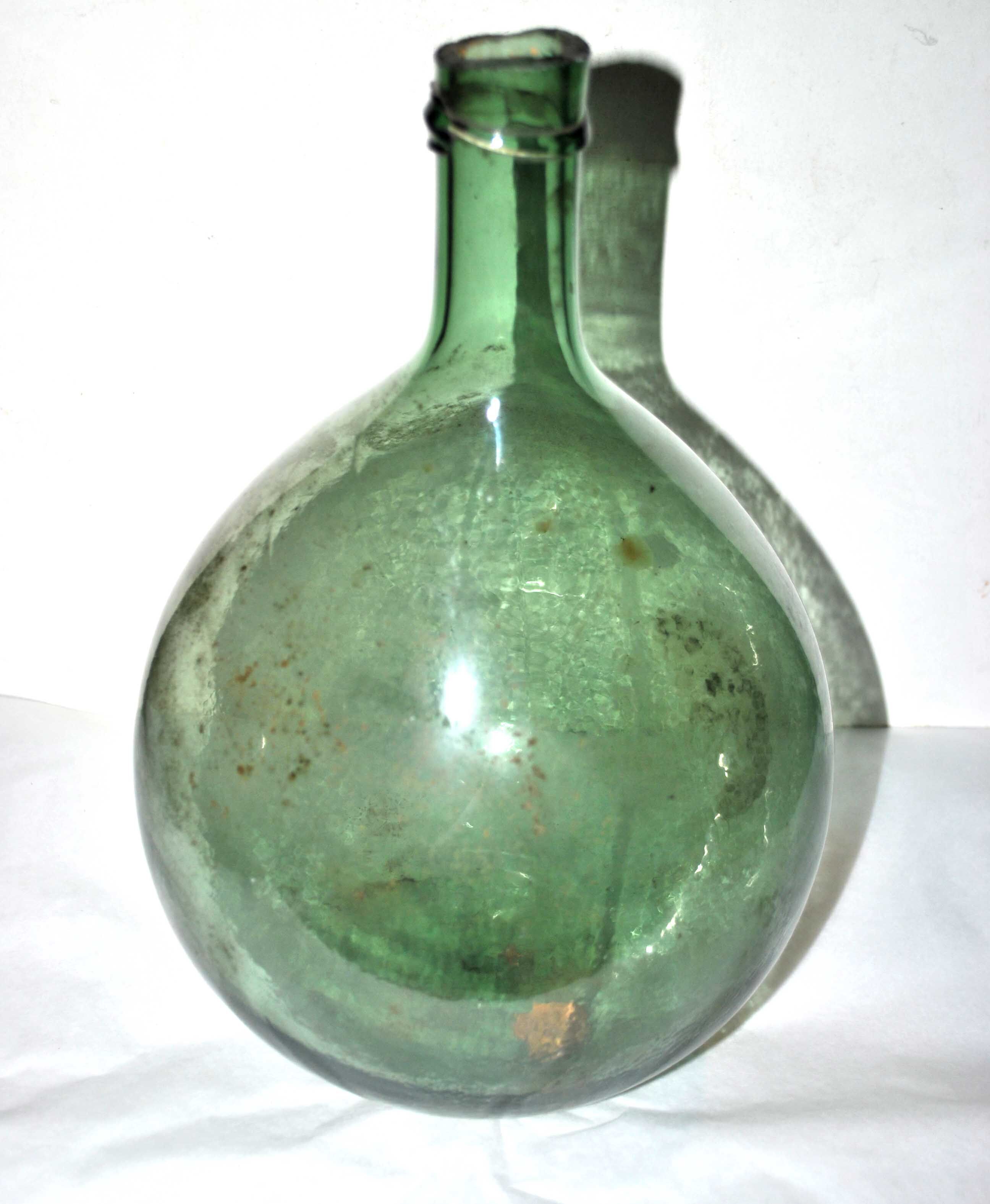 Old demijohn canister in blown green glass - Bottle all round 5L
