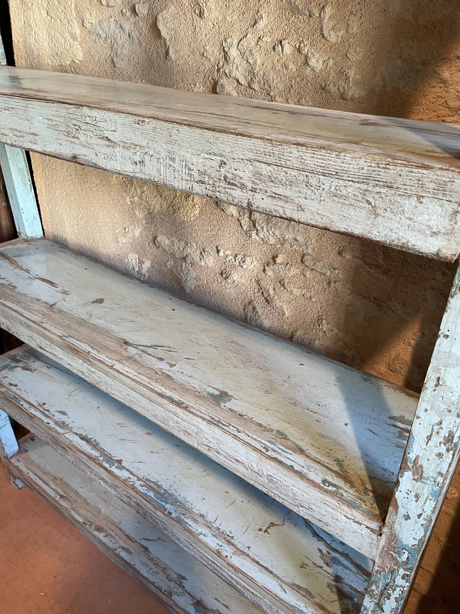 Blue lacquered teak shelves