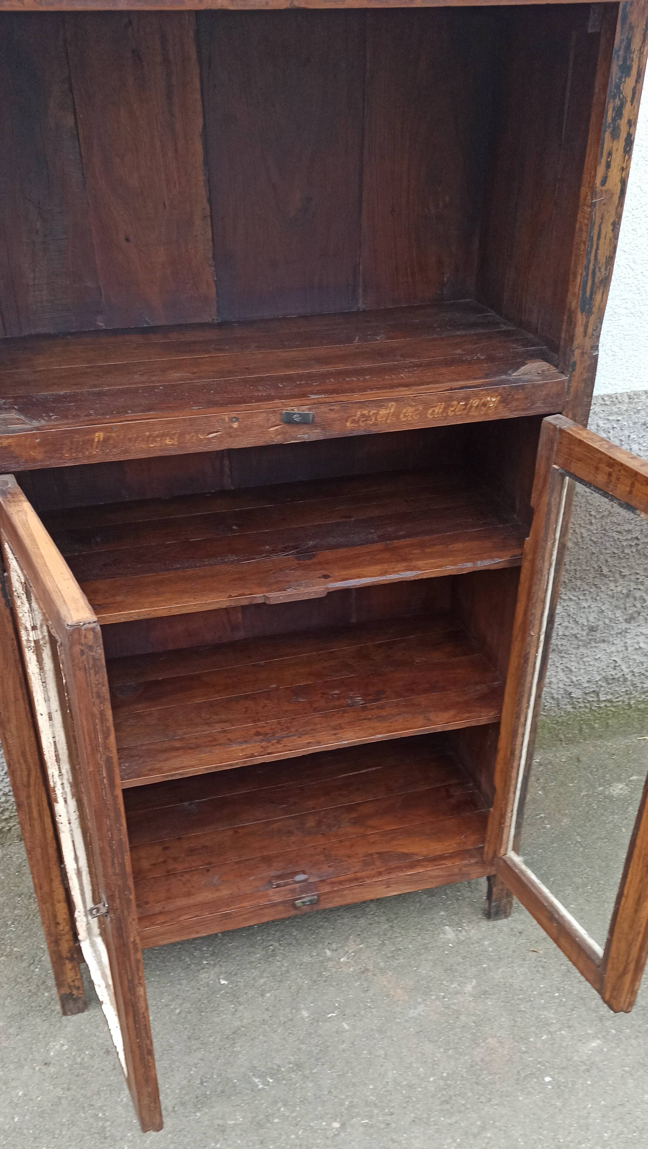 Small wooden glass cabinet with retractable door