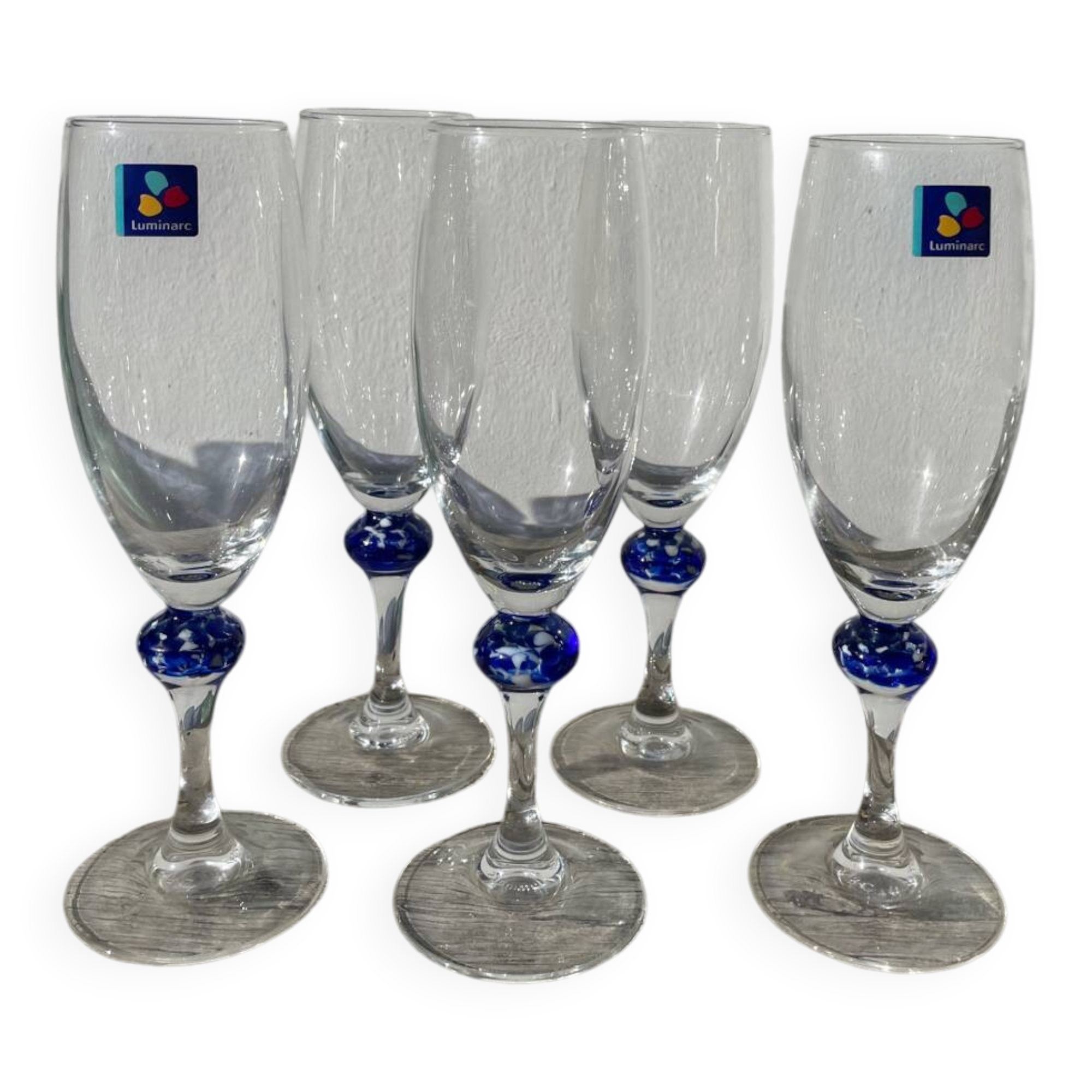 5 Luminarc blue glass flutes
