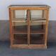 Antique wooden display cabinet with 2 doors