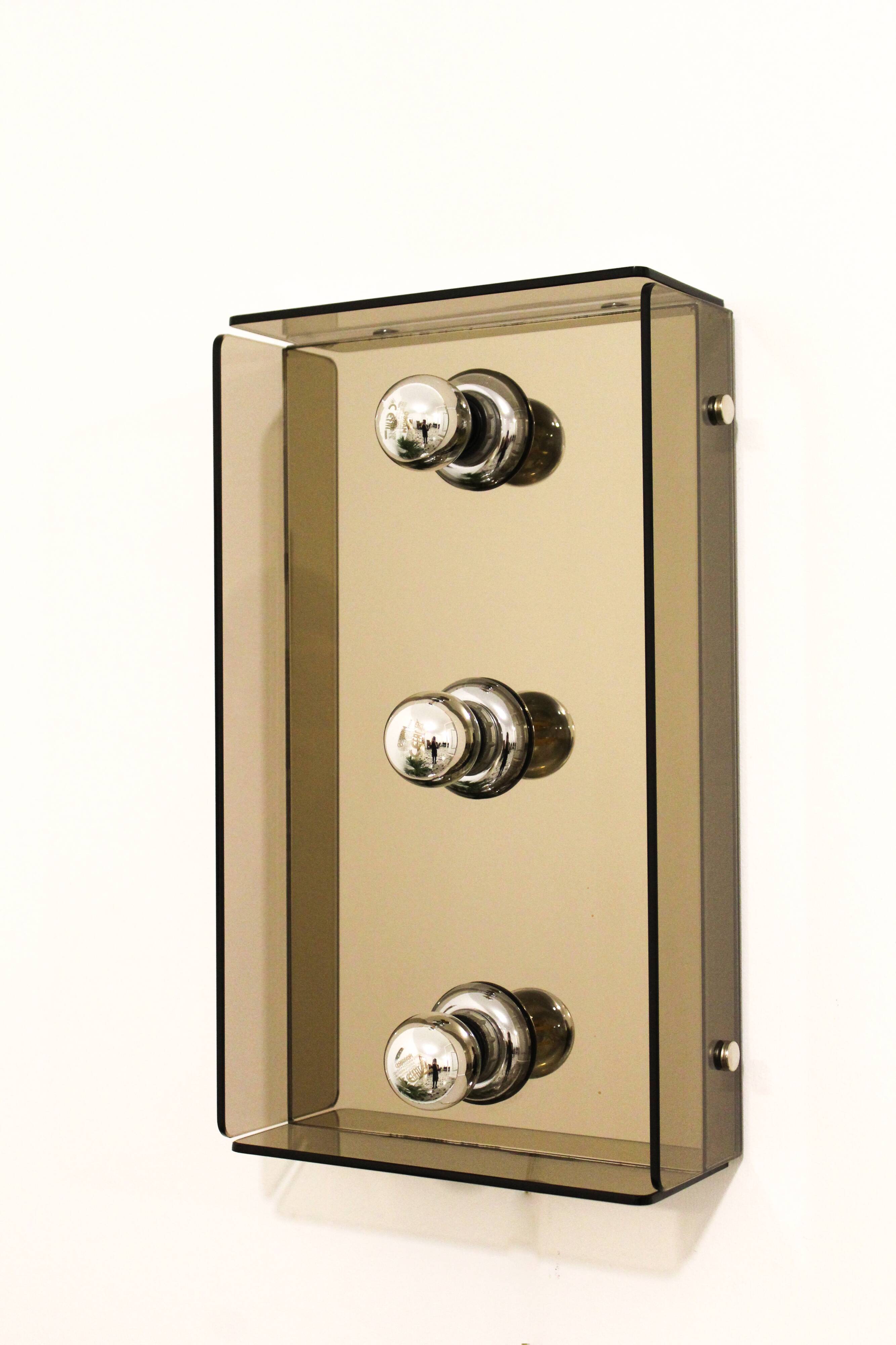 Pair of smoked glass wall lamps, mirrored bottom, Italy 70s