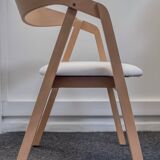 Professional chairs in beech and coated white textile