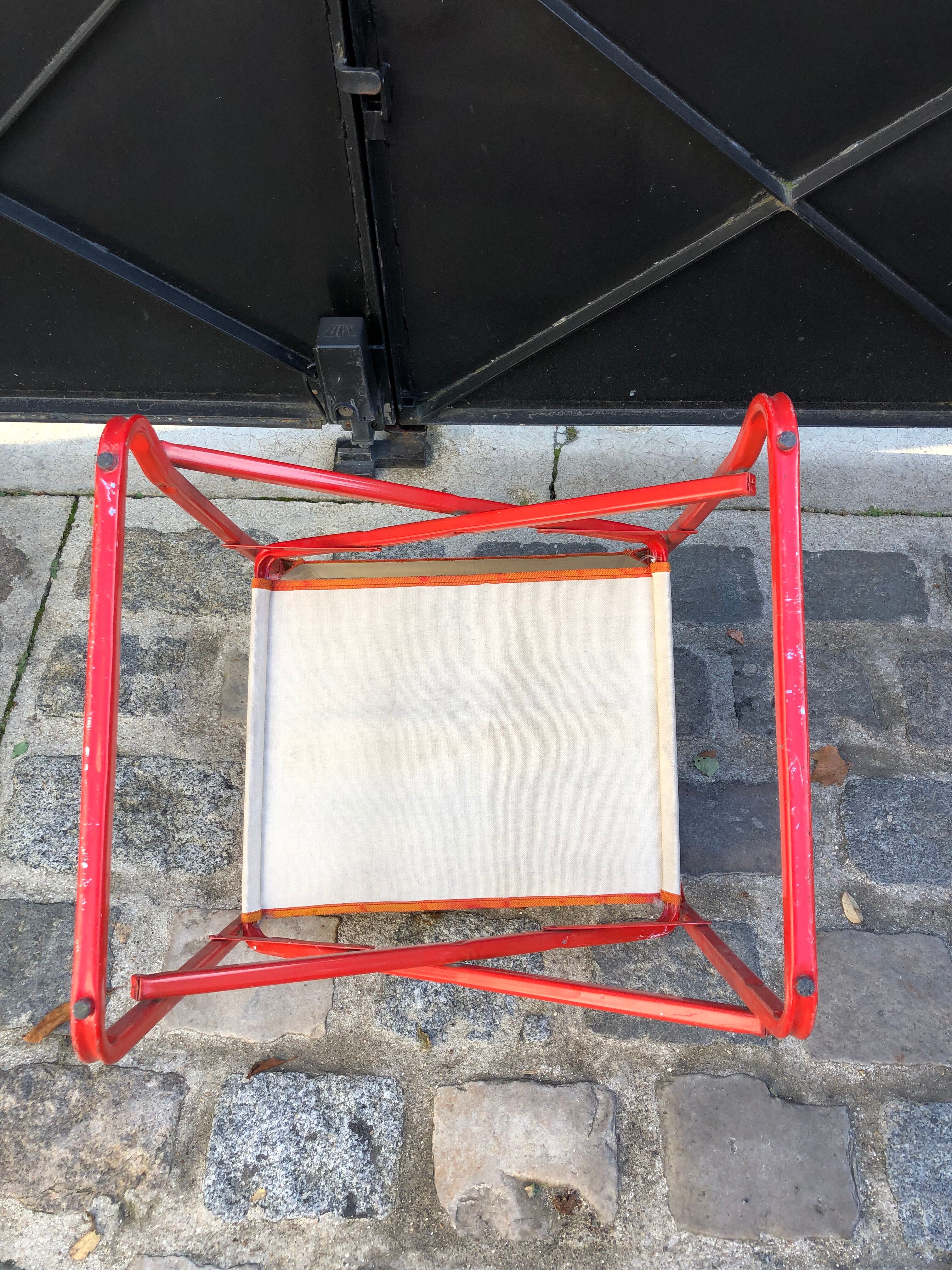 Folding metal armchair