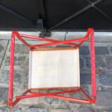 Folding metal armchair