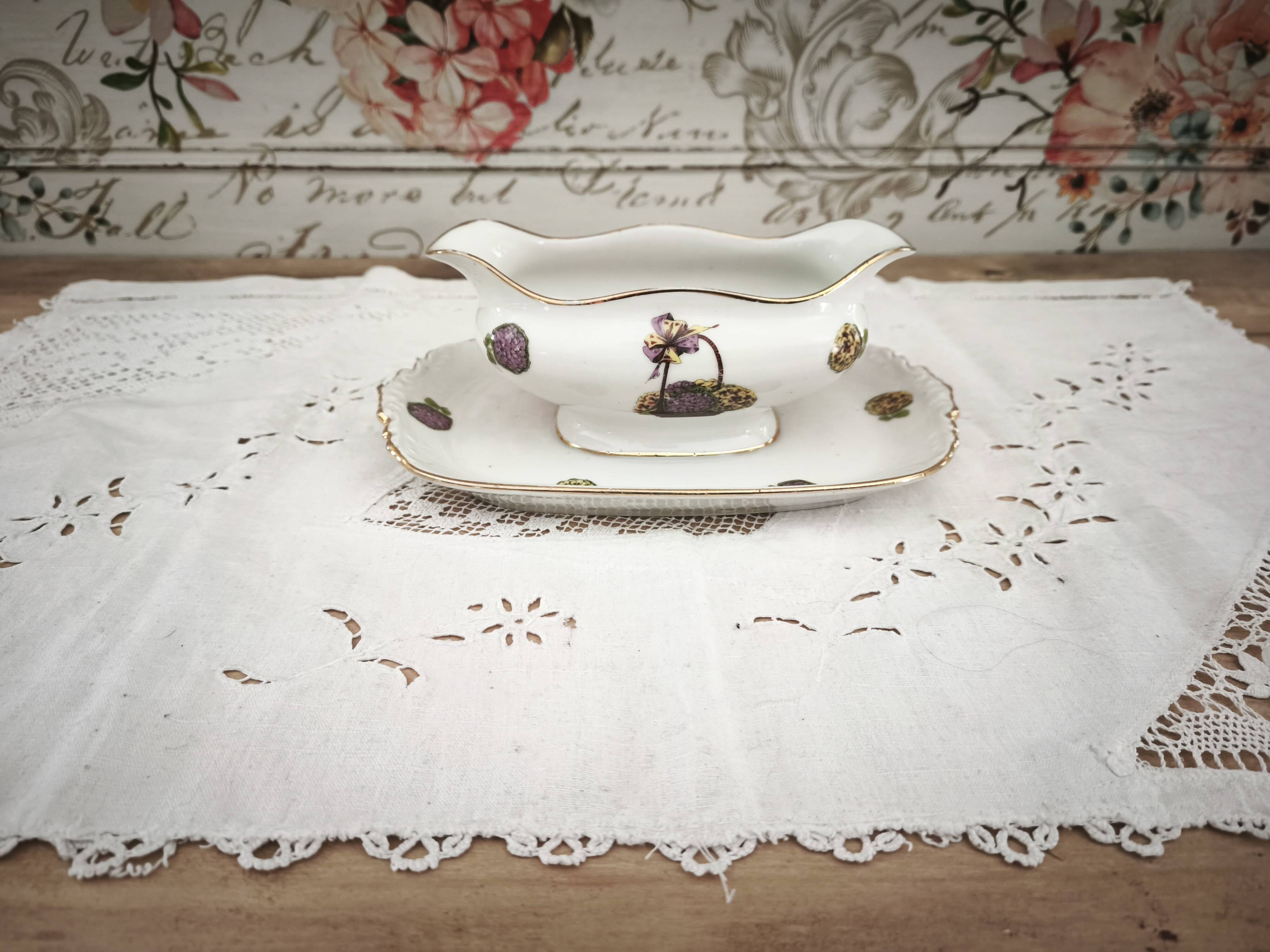 Sauce boat on a Limoges porcelain base with a hydrangea basket design.