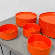 Vintage "Max" orange plastic dinnerware set 1964